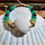 Thumbnail: Seashell and hemp bracelet with jasper and green aventurine beads and green glass beads