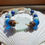 Thumbnail: Handmade sea glass bracelet with blue sea glass, lapis lazuli, amazonite, coconut shell, and blue recycled glass beads