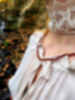 Orange hessonite garnet necklace worn with medieval style outfit