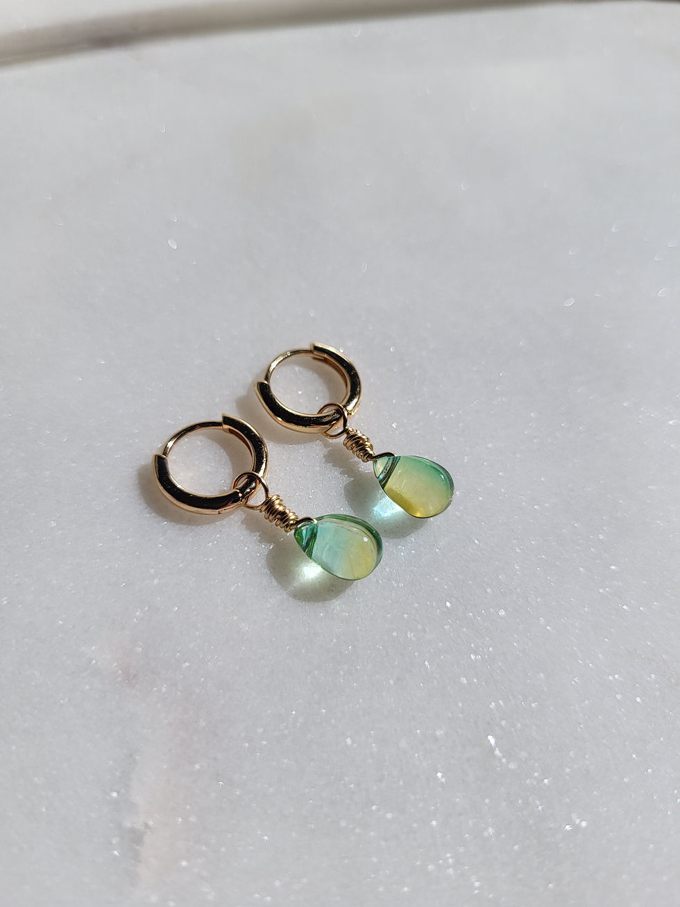 Thumbnail: Blue green czech glass droplet gold huggie hoop earrings