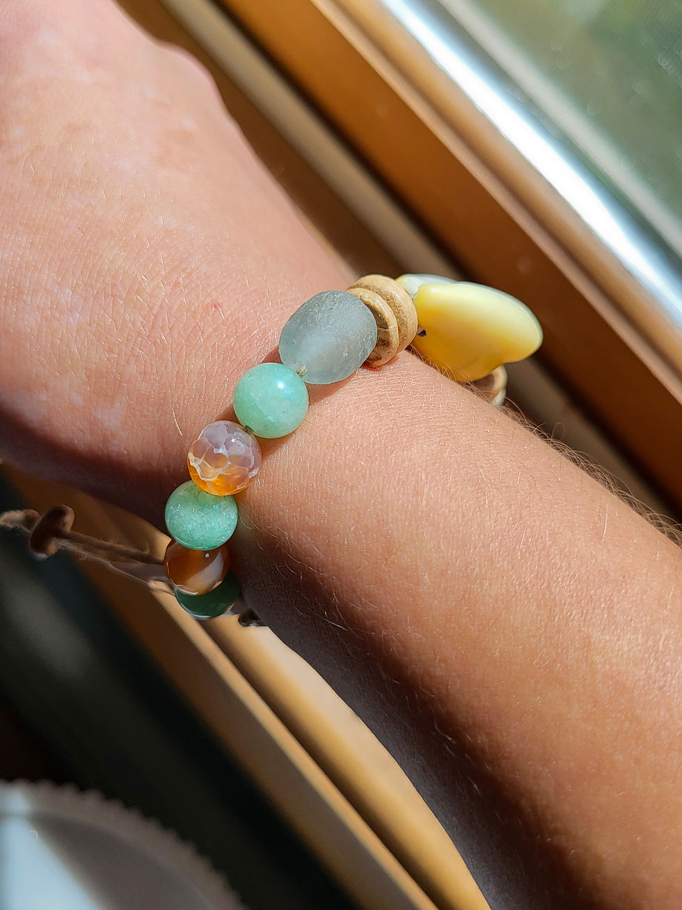 Thumbnail: Handmade cowrie shell hemp bracelet with agate and mint quartz beads, blue recycled glass beads, and coconut shell beads