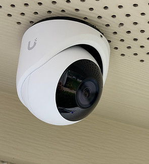 Exterior security camera installed by Smart Tech Innovations in Bryan, TX with hidden wiring