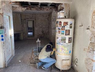 Chateau des Vieilles Vignes. Renovations. Removing old hot water tank