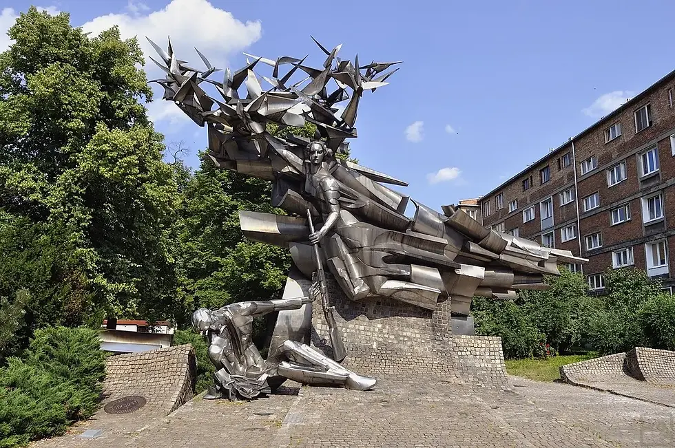 Monument to the Defenders of the Polish Post Office on the square in front of the museum
