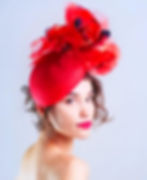 Woman in smaller hat by @saharmillinery on instagram