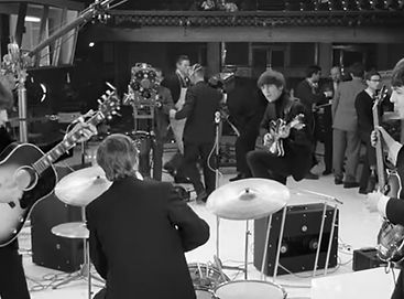 Follow the Beatles documentary with the Beatles setting up for a scene in "A Hard Day's Night" 1964