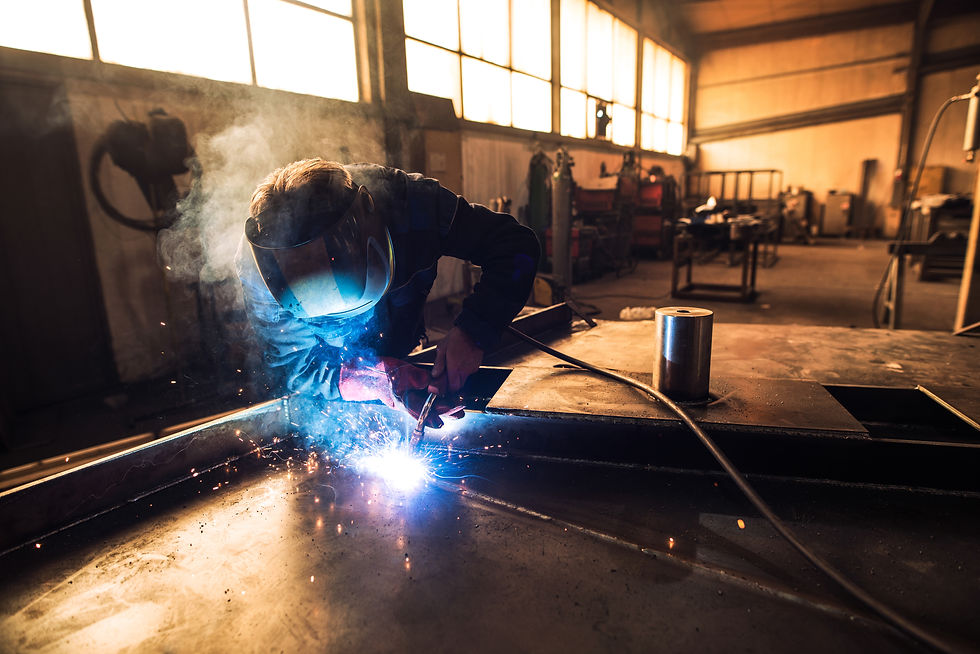 professional-welder-protective-uniform-helmet-welding-metal-part-workshop.jpg