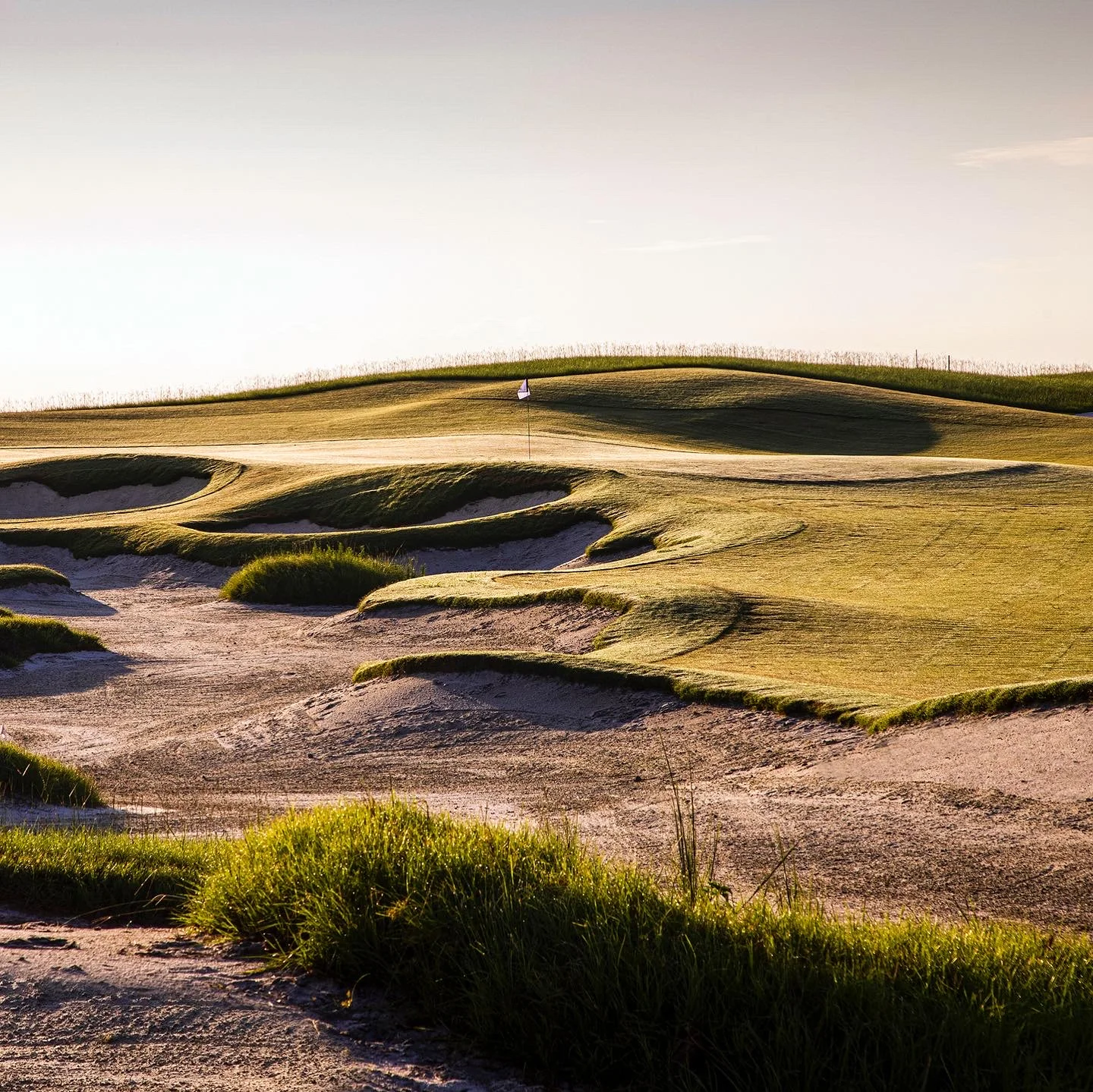 Panther National's 18-hole championship golf course is opening to members November 2023, featuring 218 bespoke homes powered by Tesla