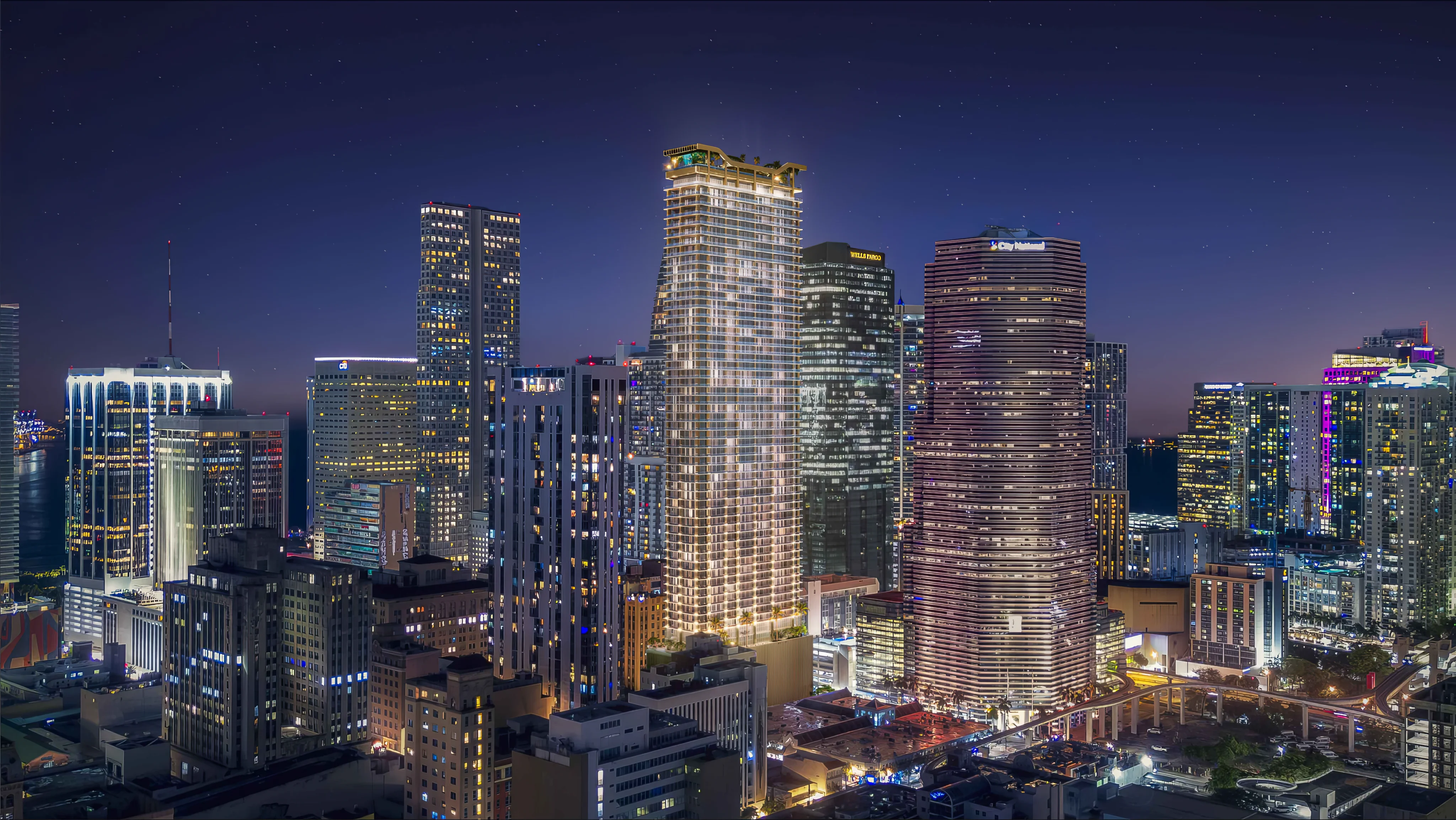 Blutrich Holdings propose Clear Residences, a 60-story 690-foot illuminated mixed-use tower in downtown Miami, offering 549 residential units and extensive amenities