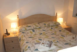 The main bedroom at Exchange Cottage, Tideswell, UK