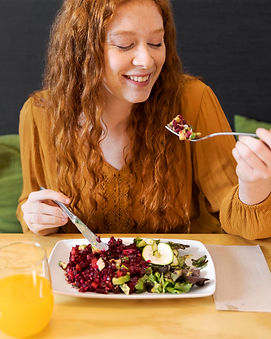 A women eating healthy diet, which is very important for immunity. - Immune Health