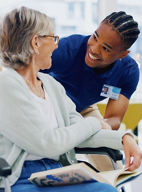 Home care aide helping senior client with personal care at home in Winston-Salem, NC