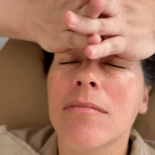 Close-up of professional buccal massage in Franklin TN showing gentle intraoral pressure used to sculpt the lower face and improve muscle balance.