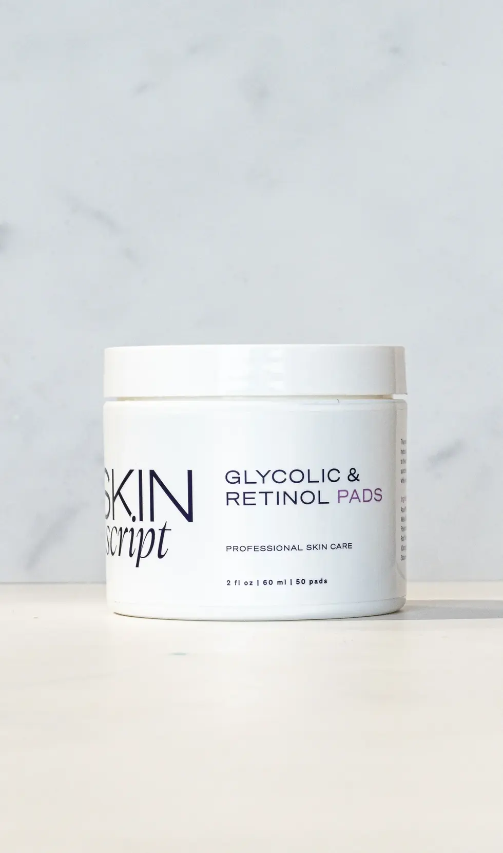 close-up of Glycolic & Retinol Pads soaked in solution for skincare