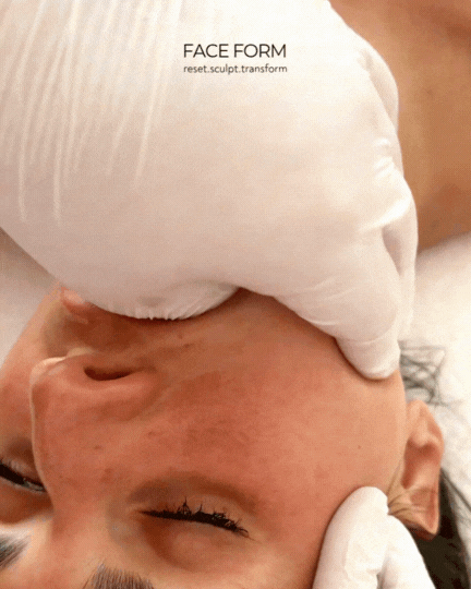 Therapist performing buccal massage in Franklin TN with one finger inside the cheek to relieve TMJ pain and deep jaw muscle tension.