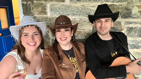 Country duo entertaining guests at an evening celebration