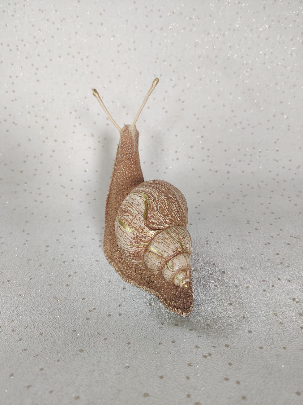 Thumbnail: Big ivory and gold coloured Snail