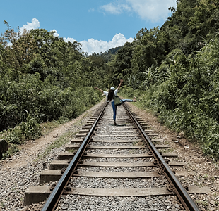 Georgie from iiNDA Wellness practicing authentic Himalayan yoga, demonstrating mindful movement and breathwork for balance, s