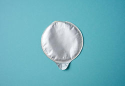 aluminum-round-lid-under-package-chips-blue-background-flat-lay-236015036