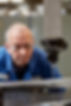Someone operating a CNC machine