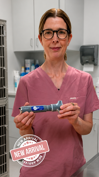 Sarah, RCVS Specialist in Veterinary Oncology, holding the Vet Jet® needle-free injector used to administer ONCEPT® canine melanoma immunotherapy.