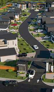 Modern residential community with contemporary homes, winding road, and green landscaping.