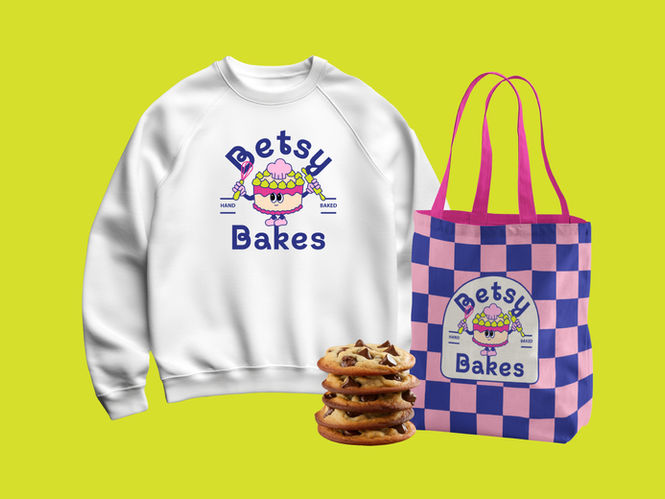 Betsy Bakes sweatshirt, checkered tote, and chocolate chip cookies