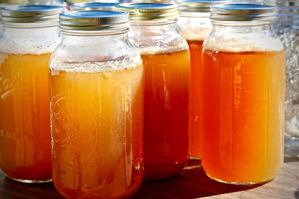 Apple cider vinegar energy drink with apple slices and glass of water