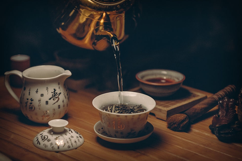 Chamomile tea for better sleep with dried chamomile flowers and cozy blanket