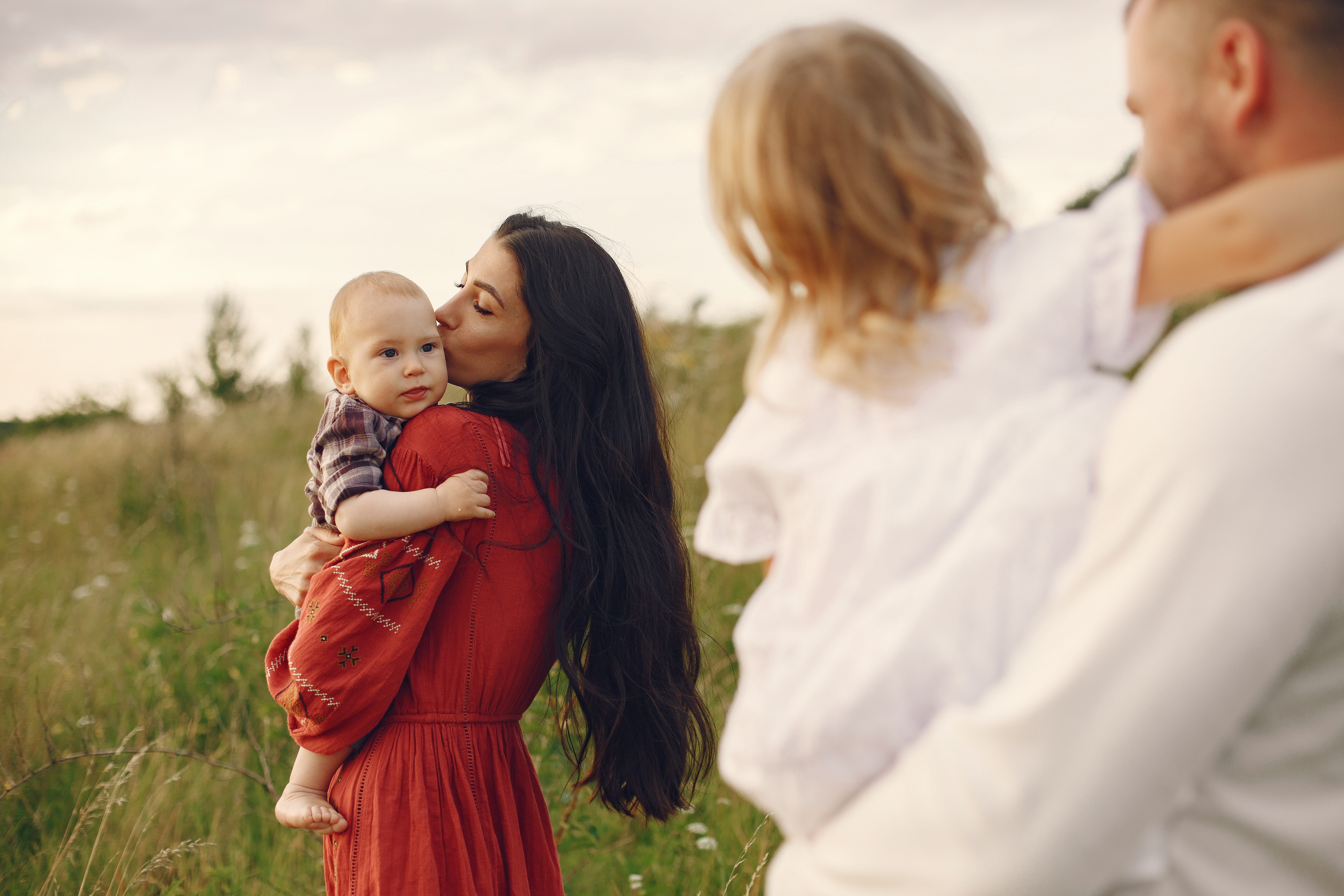 family-with-cute-little-child-father-white-shirt.jpg