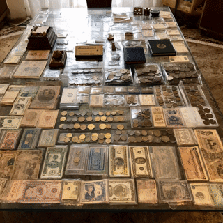 jet4444_a_table_filled_with_old_notes_and_coins_all_in_protec_370d5493-a0c3-4d92-8023-99df