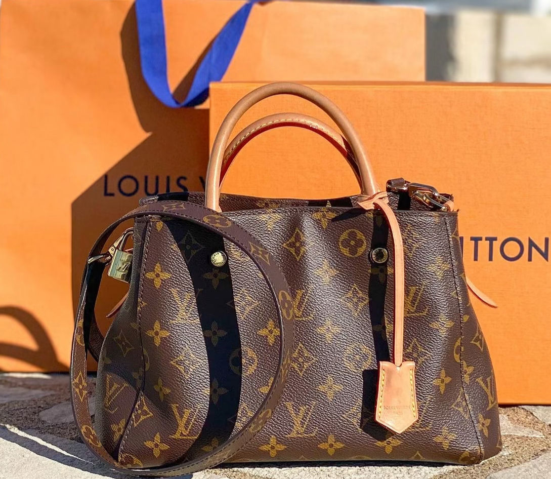 Authentic Louis Vuitton Montaigne MM handbag w/ strap (pre owned)