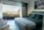 Suite%20115%20-%20letto%20e%20panorama_edited.jpg