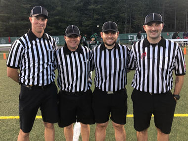 Referees from the Canadian University Field Lacrosse Association