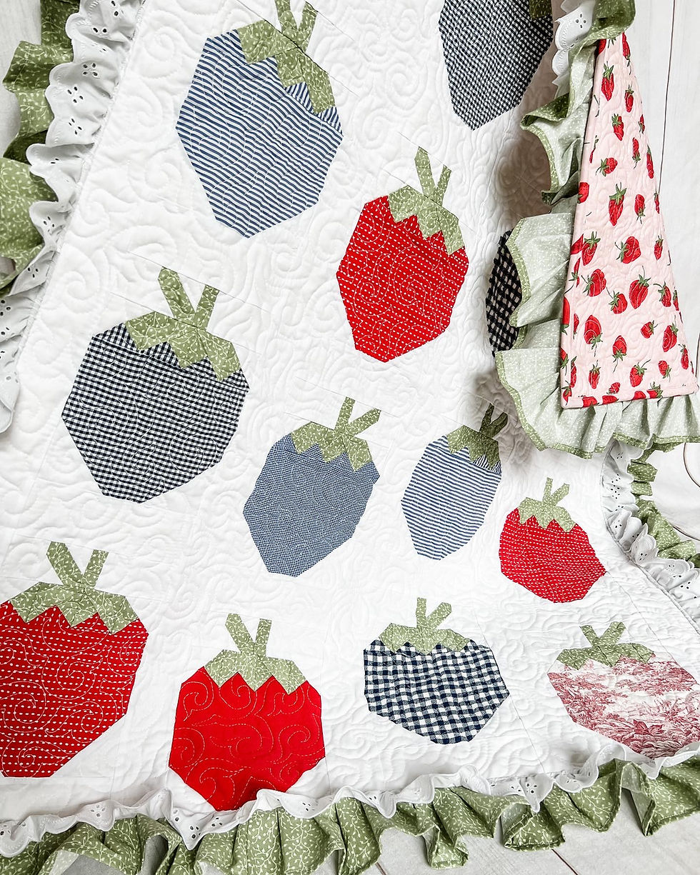 Strawbery baby quilt made with clothing