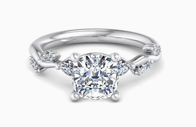 white gold cushion cut recycled gold engagement ring with vining side diamonds