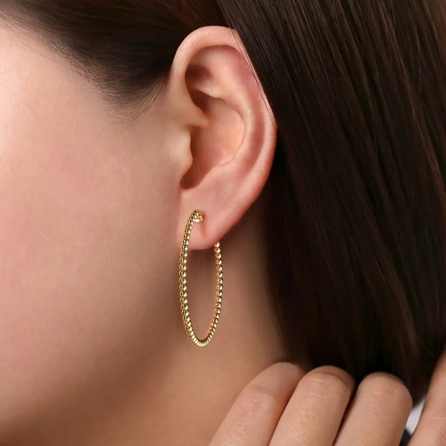 yellow gold beaded hoop earrings