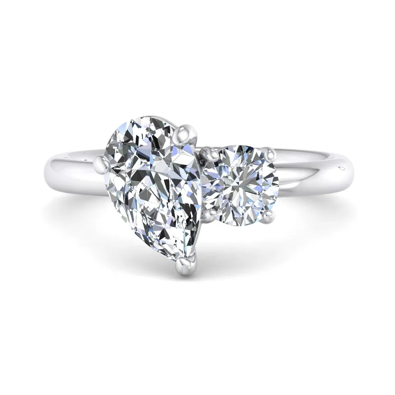 pear shape diamond and round diamond white gold toi et moi ring