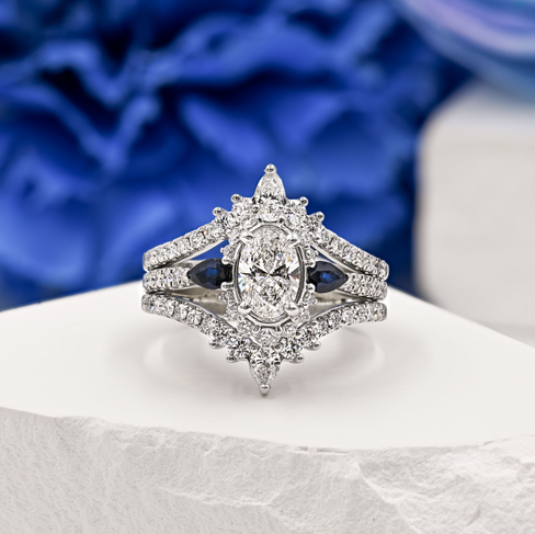 white gold split shank halo oval diamond and sapphire engagement ring