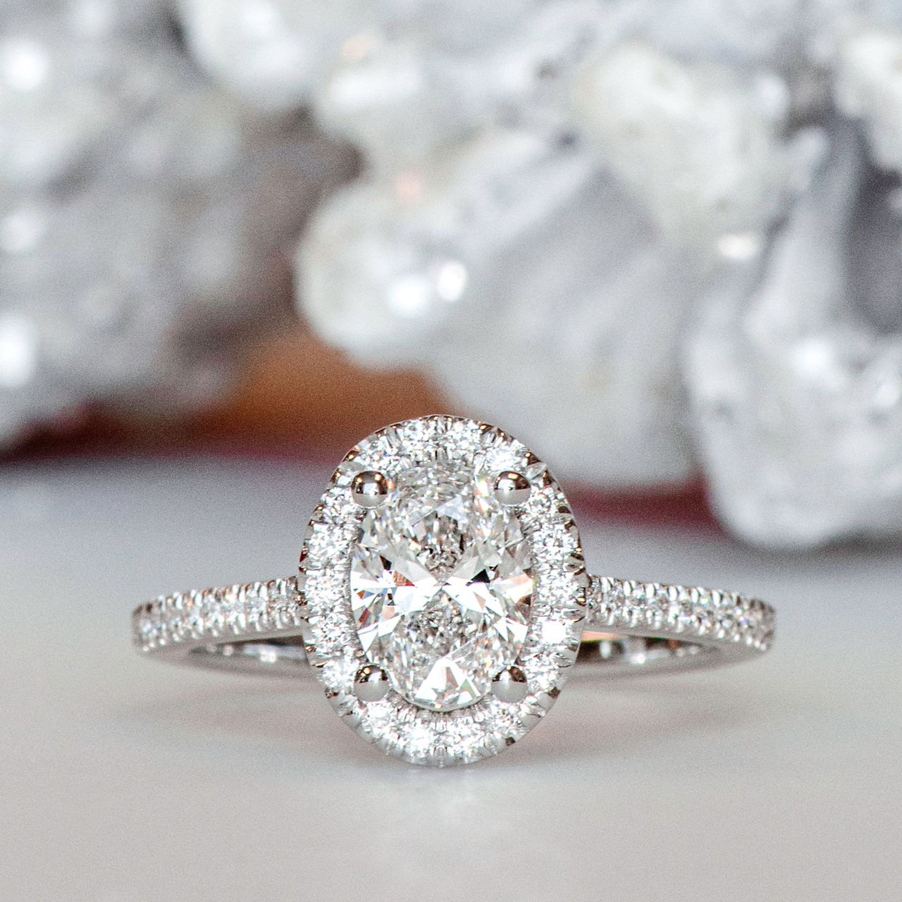 oval diamond halo engagement ring