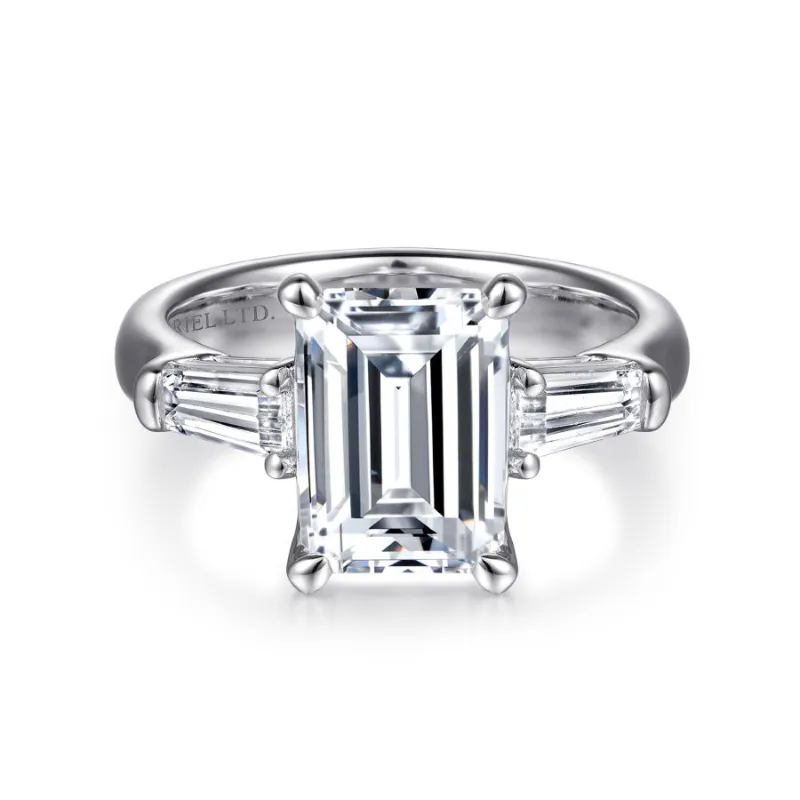 white gold emerald cut three-stone engagement ring