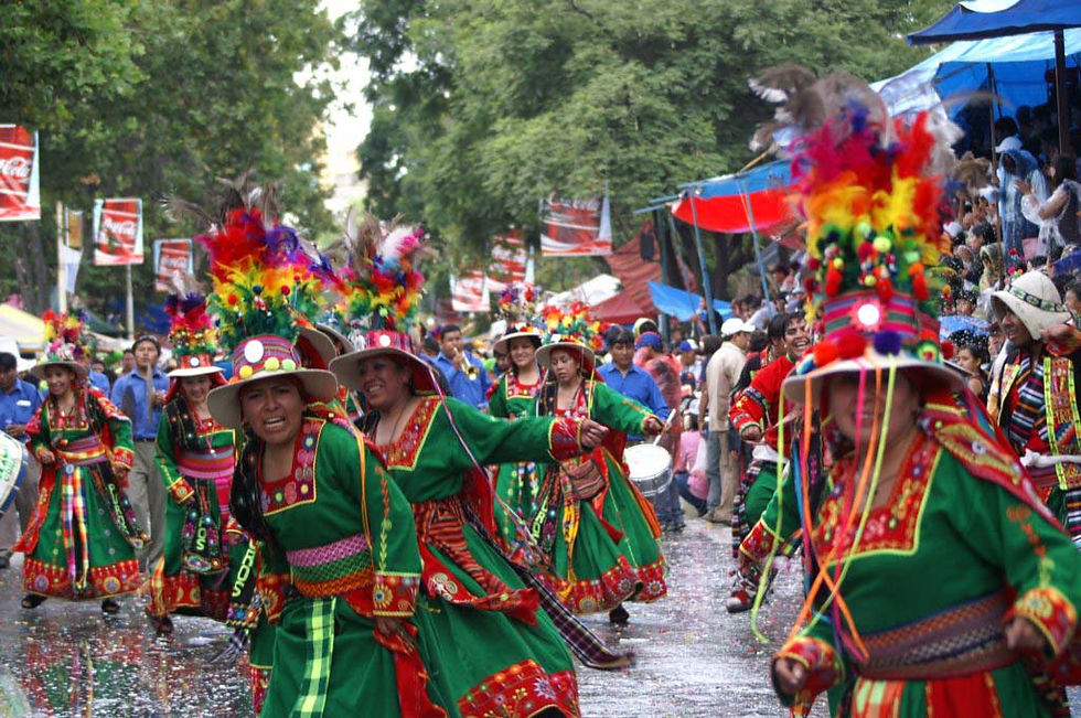 Men and women in traditional Andean costumes dancing and preparing for ritual combat during the Tinku Festival in Macha, Bolivia