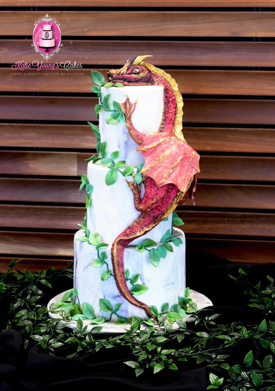 3 tier lord of the rings wedding cake with large dragon.