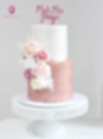 2 tier fondant cake with rose gold glitter tier and flowers