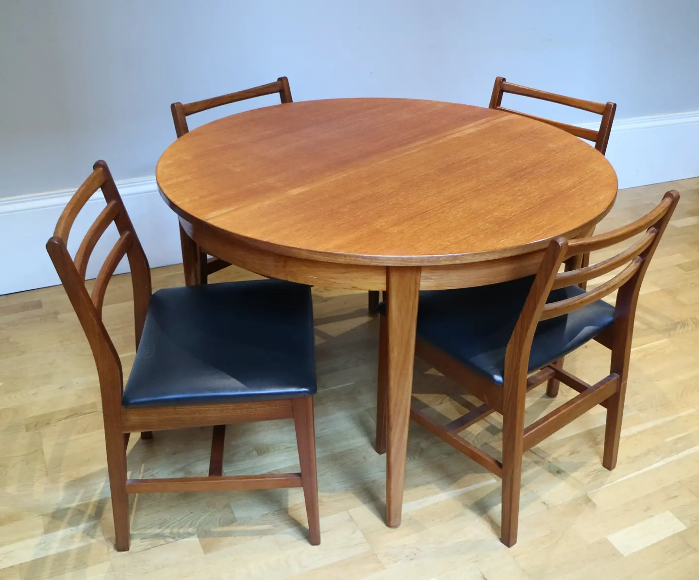Vintage Mid Century Dining Table and A Younger Chairs
