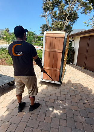 Moving a hot tub on a sled