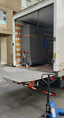 Moving a large gun safe using a liftgate. Luna's Safe Moving is a San Diego Safe Moving Company