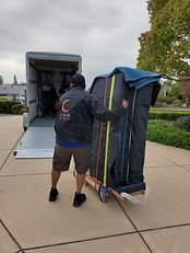 Loading a baby grand onto a trailer
