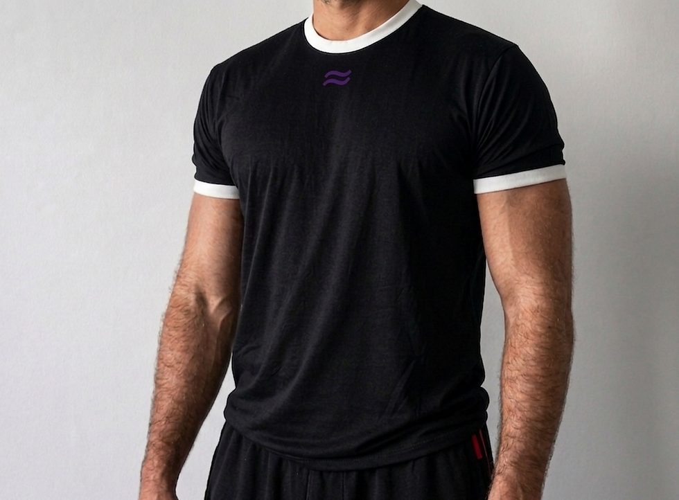 Man wearing a Gymchase black t-shirt with white trim and purple logo