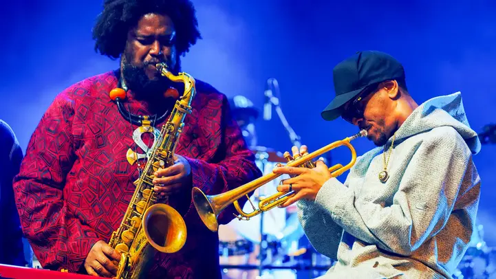 Trompetist en Saxofoonspeler samen tijdens concert North Sea Jazz.
